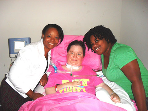 BAYADA client, Lisa with two of her nurses