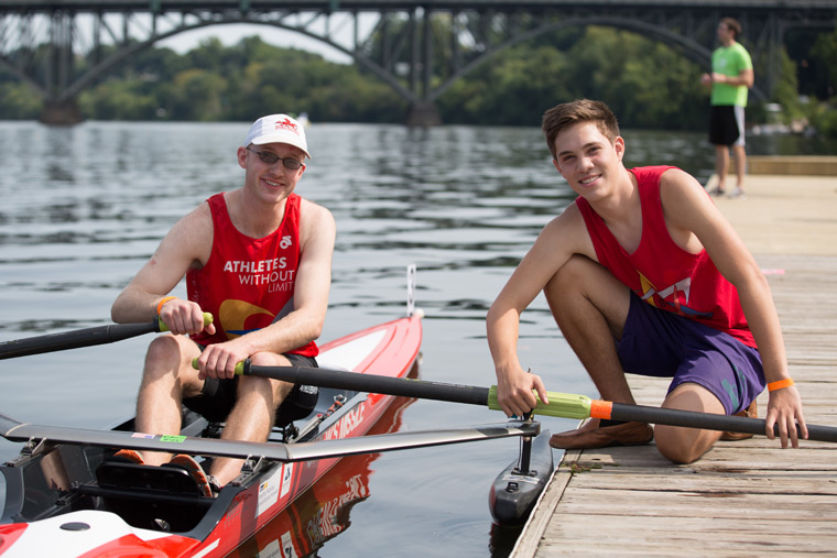 two rowers in athletes without limits tanktops